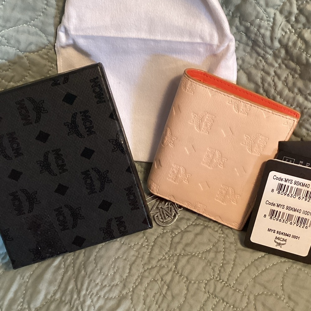 MCM calfskin Ottomar Monogram bifold wallet, with box, charm and dust cover